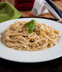 Make this Creamy Walnut Sauce for Pasta in minutes! Just toast walnuts on the stove and blend them with mascarpone and a handful of ingredients. This delicious recipe is based on a dish we ate near Genoa. #walnutsauce #walnutsauceforpasta #walnutsaucerecipe