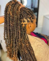 If you're looking to try something new and protective for your natural hair, Afro kinky twists are a great option to consider.