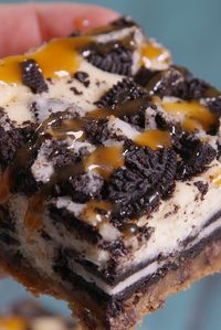 These will definitely get around. Called "Slutty Cheesecake Bars. Choc chip dough, oreos, cheesecake mixture, more oreos, warm caramel. Oh my...