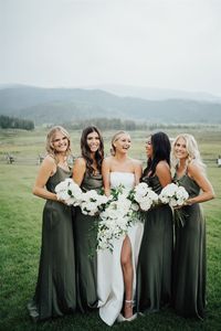 Chic bridesmaids dresses you’ll definitely want to wear again. Jenny Yoo's Sylvie bridesmaid dress channels Old Hollywood vibes in this stylish slip dress with a show stopping fit. It doesn’t get more modern and stylish than these evening gowns! Perfect for a summer, fall, winter or spring wedding, prom, or any formal event. Photo by @nateshepardphoto on IG.