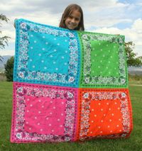 Bandana quilt (with tutorial) perfect to keep in the car for that impromptu summer picnic!   So Bandanas are super cheap at walmart and this quilt would be awesome for when we go for a picnic.