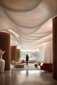 SVAREF High-end interior design inspiration reference image of a beautiful livingroom with a seemingly sculpted ceiling #sva #svaref #interior #design #modern #ceiling #light #room #decoration #luxury #living