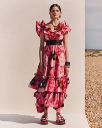 With an exploded ruffle neckline and a detachable hem tiered skirt. From the Spring/Summer 2020 pre-collection.