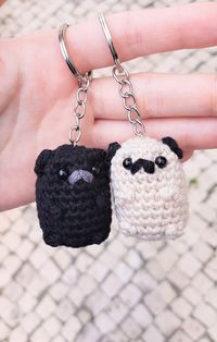 "Crochet pug keychain, a small stuffed animal pug plush perfect as a gift for a pug owner. This pug gift can be used as a keyring, backpack, luggage or pencil case charm. Makes a great key chain or prop for a pug themed party.  So if you are searching for cute pug items, black pug gifts, crochet animal keychains, dog charms, pug accessories or toys, look no further! Check my shop for other pug themed products too! 1x Pug included (choose \"fawn pug\" or \"black pug\"). For the attachments, you c