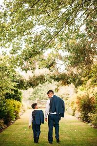 ring bearer a boy walks with groom hannah may via facebook