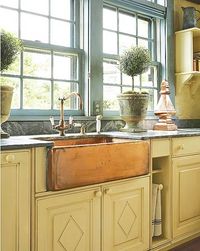 Vintage Kitchen: A rustic cottage kitchen with butter yellow cabinets, Provence blue window pains, and a copper, apron front sink. Simple and elegant.