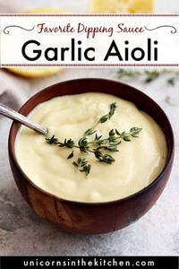 This garlic aioli recipe from scratch would change your life! This easy homemade sauce is perfect for dipping fried or crab cakes and is so delicious thanks to garlic and lemon. Check out other variations such as chipotle spicy and cilantro lime in the recipe. #aioli #aiolirecipe #homemadesauce