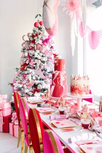 Our bright red and pink holiday table party set up for our Nutcracker themed party