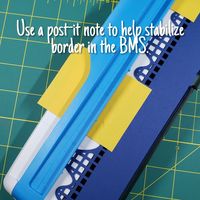 Use a Post It note to help stabilize paper when using Creative Memories Border Maker System