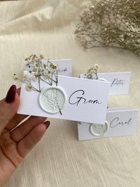 Gypsophila Name Place Card What's included: Name place card Wax seal stamp Gypsophila decoration Materials: 300gsm Linen Card Dried Gypsophila Wax seal stamp ----------------------------------------------- HOW TO PLACE AN ORDER ----------------------------------------------- 1. Purchase the quantity needed from this listing. 2. After purchase please email with your guest names as you would like them on the place cards. ----------------------------------------------- TURNAROUND AND DELIVERY -----