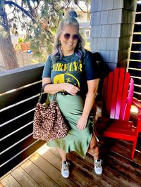 This is a 🛍️Shoppable🛍️ Pin!   Skirt outfit, Dressy outfit, date night outfit, graphic tee outfit, elevated casual outfit Graphic tee shirt, midi satin skirt, hobo bag, sunglasses, black, olive green midsize, curvy, outfit, idea, inspo, inspiration, outfit of the day, ootd, midsize ootd, curvy ootd, midsize outfit, curvy outfit, size 12, size 14, size 16, size18  #summerstyle #skirtfashion #ootd #outfits#outfitoftheday #womenswear