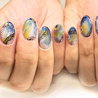 Abstract nail art design with blues and yellows. Fine lines add extra accents to the manicure as well. Click through to see what this manicure was inspired by and to see more nail art inspiration from Katie Masters aka Nail Thoughts