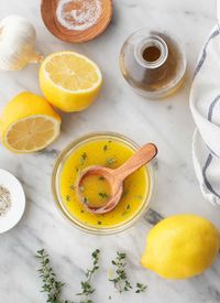 This vibrant lemon vinaigrette recipe is SO easy to make, and it tastes so much better than store bought dressing. Made with 6 simple ingredients, it's zippy and bright - perfect for tossing with salads, roasted veggies, and more! | Love and Lemons #dressing #sauce #vinaigrette #lemon 