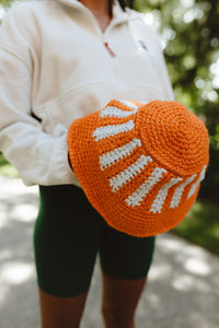 The onset of cooler weather doesn’t have to mean packing up your beloved bucket hats. Keep the trend alive with the Pulse Bucket Hat. This cute striped bucket hat is made with chunky yarn in a two-tone pattern. The extended brim means you can fold it, roll it, or wear it straight. No matter how you style it, you’ll be reaching for this bucket hat all season long.

The Pulse Bucket Hat pattern is part of the Happy Place pattern collection, designed to complement Happy Place Apricity Yarn.