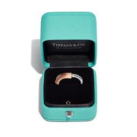 Tiffany Lock is an expression of love’s enduring protection, inspired by a padlock from The Tiffany Archives that dates to 1883. Designed to keep safe that which is cherished, Lock is a universal symbol of what matters most. This ring is expertly crafted in rose and white gold with hand-set diamonds. Wear on its own for the ultimate statement, or partner with your favorite ring stack. 18k rose and white gold with round brilliant diamonds; Carat total weight .27; Our 18k white gold is plated with rhodium to maintain its brilliance | Tiffany Lock Ring in Rose and White Gold with Diamonds, Size: 12