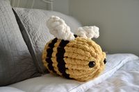 This fluffy hand knit bumblebee is a perfect stuffed animal for a little one, works well for decor, and make a great gift for Christmas, baby showers, etc. The bee is made with 100% polyester yarn and stuffed with Poly-fil.