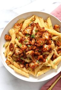 Vegan Garlic Pasta with Roasted Cajun Cauliflower. Cauliflower is tossed in homemade cajun spice blend and baked, then served over easy creamy Garlic sauce Penne Pasta. Vegan Recipe. Can be Nut-free gluten-free | VeganRicha.com