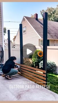 Kelsea | DIY projects & Life on Instagram: "☀️ Like & Save this Lowe’s Outdoor Refresh 🌸   [ad] Build your own DIY privacy fence for under $200 — EVERYTHING from Lowe’s ✨   👊🏻Here’s what you’ll need (if you want exactly what I have) -3 4x4 pressure treated posts -Cedar picket fence -Cabot semi-transparent stain  -Cabot solid stain  -Drill or Brad nailer -Table saw (if you want to rip the fence pieces in half)  -Rocks (for draining purposes) -Quick cement -Level   🤩 Comment “link” for the direct link to everything ! 🛍️   ———————————————  If you live in a neighborhood 🏘️ that has houses very close together — consider doing this. It provides the right amount of privacy from them without actually cutting them off completely 🙌🏻  What’s also super cool about it is — you can attach a proj