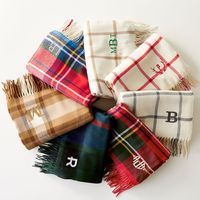 With a luxurious texture that is the definition of cozy, our super-soft throws are the perfect way to add a touch of warmth to your home these holidays. A thoughtful gift for friends and family, our throws are woven from a cashmere-like acrylic in a range of festive plaids and finished with a tassel fringe and a beautifully embroidered monogram