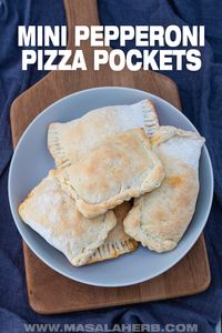 Pepperoni Pizza Pocket Recipe to make mini calzone stuffed with cheesy fresh mozzarella and pepperoni slices. Take them to work or to school for lunch, serve them up as a TV Friday night dinner meal or enjoy them with your family and friends as a party snack. Great at children's parties and as game day bites! www.MasalaHerb.com