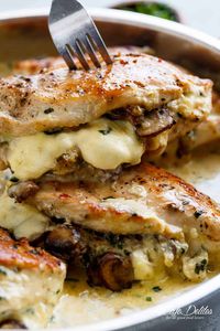 Cheesy Garlic Butter Mushroom Stuffed Chicken WITH an optional Creamy Garlic Parmesan Sauce! Garlic Mushroom lovers this is THE recipe of your dreams! | cafedelites.com