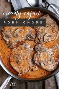 Creamy Cajun Pork Chops ~ pork chops smothered in onions and mushrooms, in a spicy Cajun cream sauce. #thehungrybluebird #creamycajunporkchops #cajunporkchops #porkchops #cajunrecipes #comfortfood #dinner