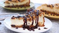 Layer a dreamy cheesecake on top of a cookie crust for a divine dessert.