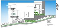 The left side elevation view of the 22x19m faculty quarters building AutoCAD drawing is given in this file. This is G+ 1 faculty building. On this plan, the living room, kitchen, dining area, lavenderia, and terrace is available.