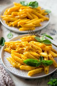 Easy Creamy Butternut Squash Pasta. Made with a roasted butternut squash sauce, it's thick, creamy, comforting and so delicious. A must try pasta recipe from insidetherustickitchen.com #pasta #easyrecipes #squash #italianfood #dinnerrecipes