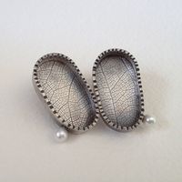 Hey, I found this really awesome Etsy listing at https://www.etsy.com/listing/130164534/modern-silver-and-pearl-earrings