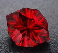 Red beryl, the rarest gemstone on earth (worth 1000 times more than gold by weight). Photographed by Robert Weldon