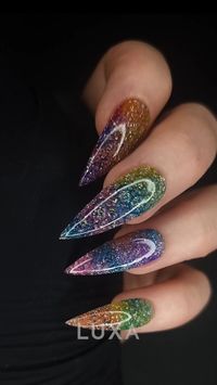 What's the weirdest technique you've surprised a client with? For us, the soap bubble technique always takes the cake! Using the Galactic Vibes Collection, we created this stunning bubble nail art and embellished it with LUXA Chrome for an out-of-this-world finish. Want to try this unique look? Shop the Galactic Vibes Collection now!   #luxa #luxapolish #bubblenails #nailinspo #GalacticVibes