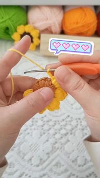 crochet this tiny sunflower for her