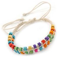 Multicoloured Wood Bead Friendship Bracelet With White Cord - Adjustable Features a plaited white cotton cord design accented with small multicoloured wooden beads. Treat a loved one to something special with this fashion-forward friendship bracelet. This woven bracelet secures with an adjustable Chinese knot so it should fit most wrist sizes. Add a pop of colour to your everyday jewellery look with this simple woven bracelet. The bracelet is about 10mm in width. Murzana offers a great selection of fashion and costume jewellery: affordable everyday necklaces, chokers, bracelets, bangles, armlets, rings, earrings, brooches, hair jewellery and other accessories. We invite you to check our whole range and decide on your favourite items by adding the them to your wish list or straight to your