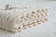 A charming knit baby blanket pattern using the cloverleaf eyelet stitch and finished using a cloverleaf crochet edge. This sweet blanket makes the perfect gift for the new baby in your world.When my d...