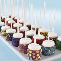 These candy-coated marshmallow pops offer an impressive array of textures and color, thanks to assorted Wilton Sprinkles!