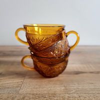 3 Vintage Amber yellow glass cups with floral design. Retro Kitchen. Depression glass replacements. 3.5'' wide, 2 1/4'' tall. Excellent condition.  Save on shipping when you buy multiple items from my shop!