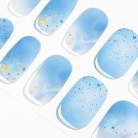 Capture the essence of a perfect summer day with our Summer Sky Gradient Semi Cured Gel Nail Strips . These enchanting nails boast a soft gradient from a crisp light blue to a subtle white, adorned with delicate cloud designs and tiny star accents.