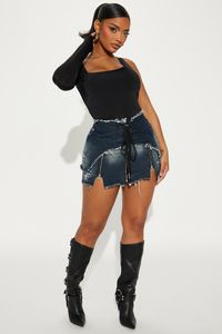 Available In Dark Wash. Mini Skirt Lace Up Detail Zipper and Drawstring Closure Side Pockets Frayed Edges Hardware Detail Non-Stretch Zipper Detail Disclaimer: To Keep The Aesthetic Of This Garment, Please Follow The Care Instructions Carefully. 78% Cotton 22% Polyester Imported | Dark Angel Frayed Denim Mini Skirt in Dark Wash size XS by Fashion Nova