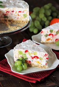 Fruit Salad Cheesecake with Maraschino Cherries and Nilla Wafer Crust image