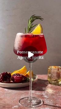 VICI COLLECTION on Instagram: "Who doesn't love an aperol spritz? Save this festive recipe, courtesy of @bevsbybeverly, to make this holiday season ✨

Ingredients:
2 oz pomegranate juice
2 oz Aperol
4 oz Prosecco
1 oz soda water
Pomegranate arils, orange slice, and rosemary for garnish"