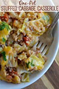 Easy Stuffed Cabbage Casserole is a one pot dinner recipe that is ready in 30 minutes or less! Perfect for a quick weeknight meal.