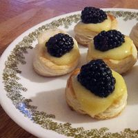 Frozen puff pastry cut into small rounds makes a quick yet elegant dessert. Chef John suggests you fill them with lemon curd, chocolate mousse, or anything you choose!