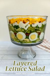 Make-ahead seven layer lettuce salad with hard boiled eggs and bacon is perfect for potlucks, family gatherings, to take for your lunch to work, or just simply enjoy anytime. Amish layered salad,  layered salad with peas