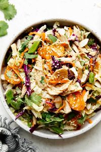 This Chinese-inspired Chicken Salad is refreshing, healthy, and filling in all the right ways. Packed with crisp-crunchy veggies, toasted nuts, tender chicken, sweet oranges, and a delicious sesame-ginger sauce, you're sure to love this gluten-free and Whole30 Chinese chicken salad recipe. 