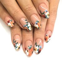 Amazing floral nail art with a nude background. Flower nails are such a hit and never get old. This manicure is perfect for any season. Click through for more nail art inspiration from Katie Masters aka nail thoughts !