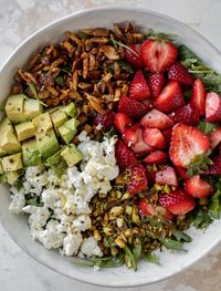 This strawberry salad is the best spring and summer meal! Super crunchy and textured with avocado and goat cheese. Absolutely delicious.