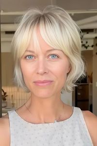 The 90s Bixie cut features a shaggy bob/pixie with tones of small, choppy layers that achieve a more textured, dimensional, and overall voluminous look. @bloesalons