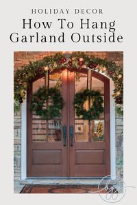 If you've been curious on how to hang beautiful holiday garland on your porch or outdoors - this blog post will show you how to hang garland! Whether you have to hang garland on brick, on a wall or around a door, this post breaks it down. Garland can make your patio or porch look and feel so festive for the holidays.