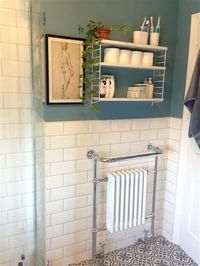 Like the idea that white tiles will be more timeless and paint is easy to change